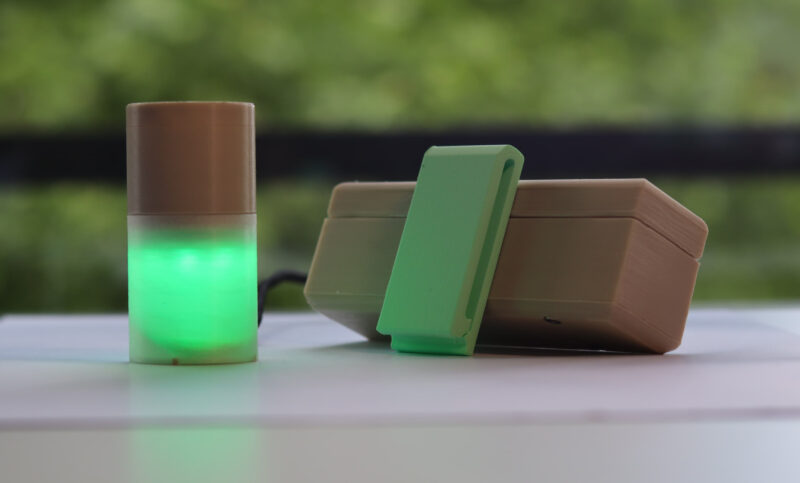 FallSense system composed of two parts: the base station (left) and the detection device (right).